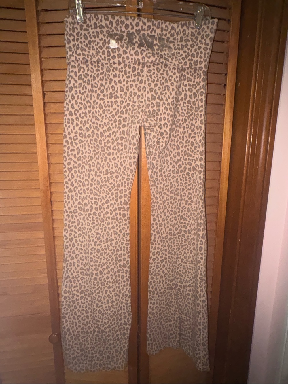 PINK leopard flared leggings.